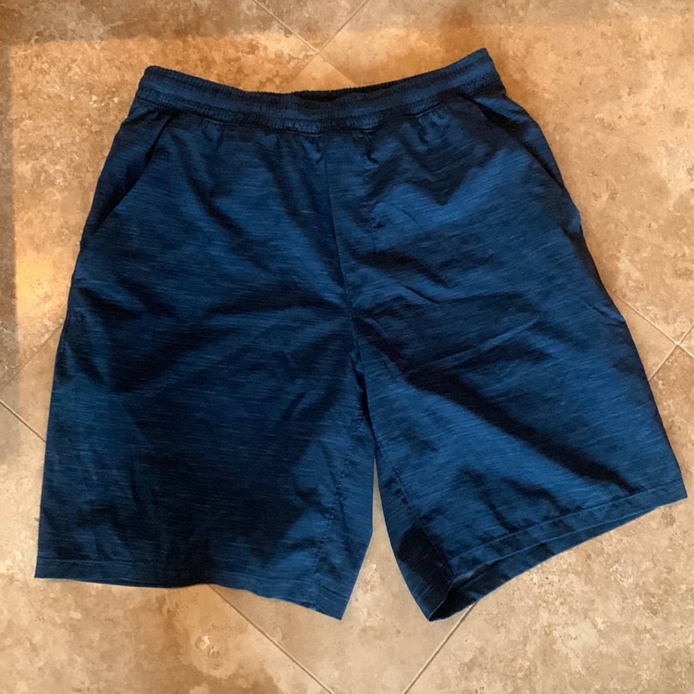 Men’s Lululemon shorts in a dark blue.